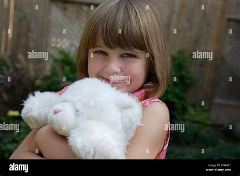 Girl Holding Teddy Bear Stock Photo Alamy