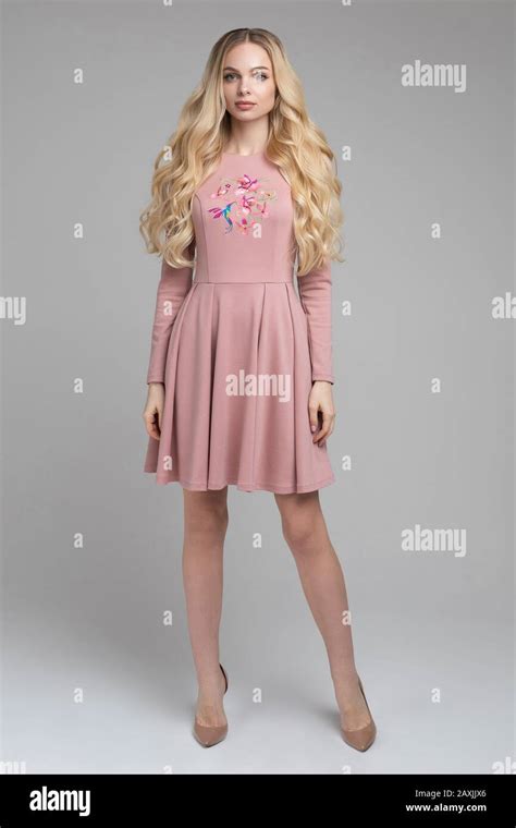 Stock Portrait Of Gorgeous Blonde In Pink Dress Stock Photo Alamy