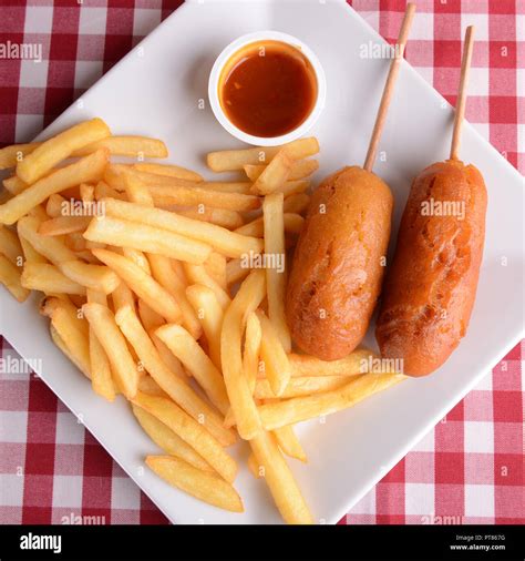 Corn Dogs With Fries Stock Photo Alamy