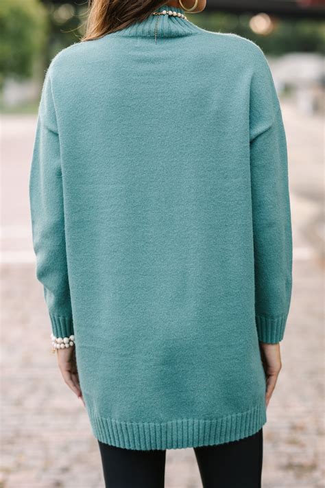 teal color sweater 4
