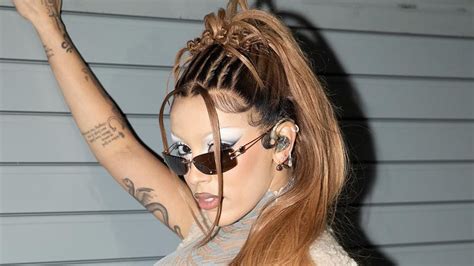 Doja Cat Shows Off Her Curves In A VERY Racy Nude Colored Bodysuit As She Poses Up A Storm In