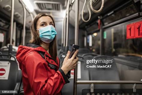 Bus Woman Mask Photos And Premium High Res Pictures Getty Images