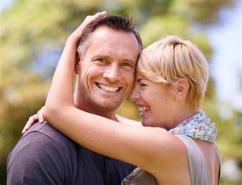Infinte Love A Mature Couple Sharing A Tender Moment Outdoors Stock Image Image Of Looking