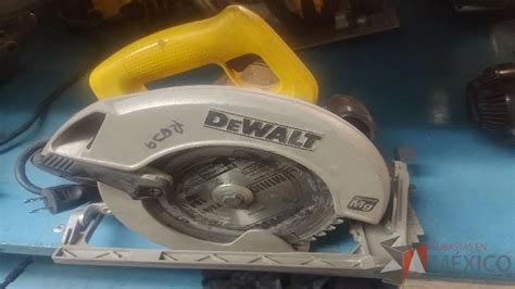 Lote 024 - Sierra circular manual DEWALT, Modelo: DWE 575-BE - Subastas ...