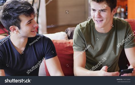 Two Young Male Friends Talking Chatting Stock Photo 734716900 | Shutterstock