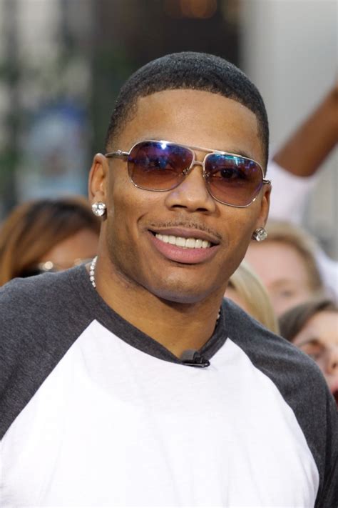 Nelly Drops by TV Show "Extra" to Promote New Album "5.0"