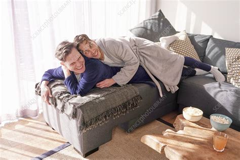 Happy Gay Couple Relaxing On Sofa Stock Image F Science