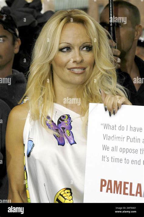 Pamela Anderson Wears A Colorful Spring Like Dress On A Very Dreary Day In Toronto As Shes