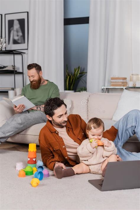 Gay Parent Sitting Near Baby Daughter Stock Photo Image Of Bearded Homosexuality