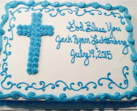 Jacks Baptism Cake With Blue Frosting And Cross Decoration