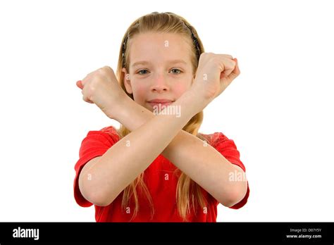 Jeune Fille Blonde Fait Signe X Avec Ses Bras Sur Fond Blanc Photo Stock Alamy