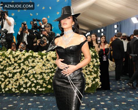 Kim Kardashian Sexy Shows Off Her Sizzling Curves And Cleavage In A Hot Skintight Leather Dress