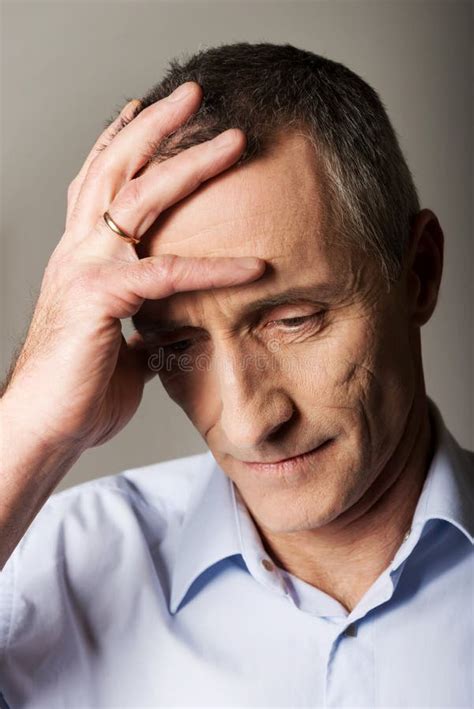 Depressed Mature Man Touching His Head Stock Image Image Of Depressed