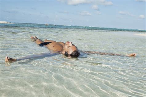 Muscle Wet Naked Man Lying In Sea Water Stock Image Image Of Abdomen
