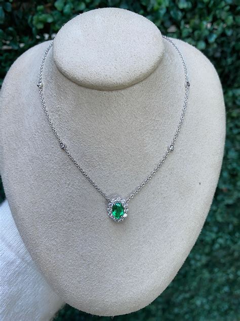 Oval Cut Emerald And Diamond Halo Pendant Necklace For Sale At 1stdibs