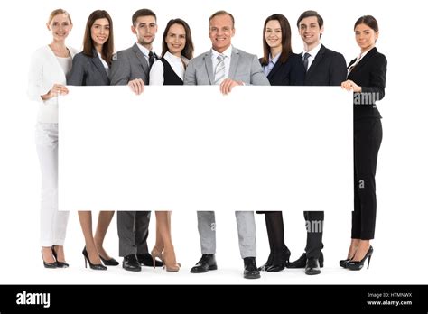 Full Length Portrait Of Business Team Holding Blank Billboard Isolated