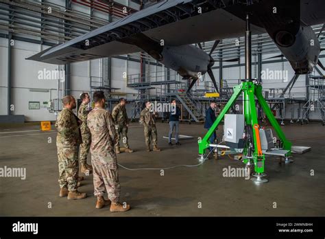 A team of U.S. Air Force Airmen and the manufacturers of an electronic ...