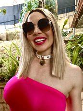 Busty Kylee Nash Loves Showing Off Her Amazing Tits In Her Warm Garden Photos