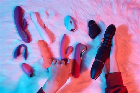 Premium Photo Desire Concept Woman Lying In Bed Holding A Dildo