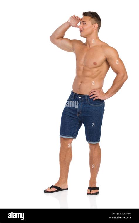 Half Naked Fit Man In Jeans Shorts And Black Flip Flops Standing Holding Hand On Forehead And