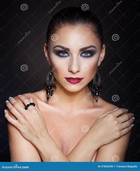 Expensive Jewelry Wreath Earrings And Ring On A Beautiful Nude Elegant Brunette Girl With Bared