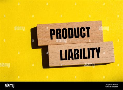 Product Liability Words Written On Wooden Blocks With Yellow Background Conceptual Product