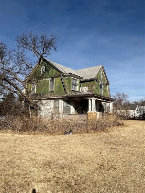 Small Kansas town unites to save historic house