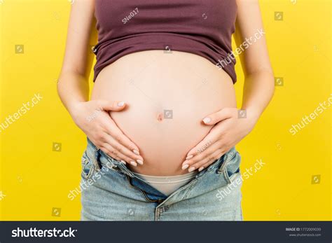 Close Naked Pregnant Womans Belly Wearing Stock Photo 1772009039 Shutterstock