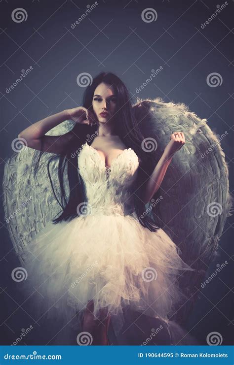 Delicate Beautiful Brunette Woman Posing With Angel Wings Studio Shot Stock Image Image Of