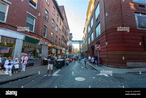 People In The Street Celebrating The St Anthony Feast Outside Of Bova S Bakery Salem St