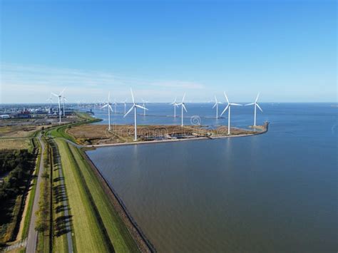 Aerial View Of The Sea With Wind Turbine Engines On The Coast Stock