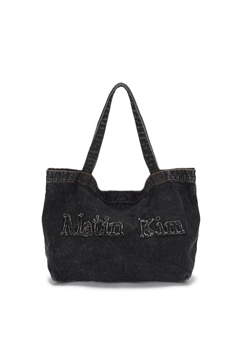 Logo Washed Denim Tote Bag In Black Matinkim