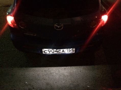 Подсветка заднего номера — Mazda 3 (1G) BK, 1,6 л, 2006 года ...