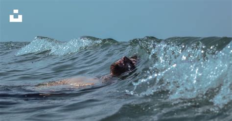 Man on ocean photo – Free Sea Image on Unsplash