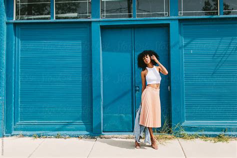 "Portrait Of A Beautiful Young Black Woman Posing Outdoors" by Stocksy ...