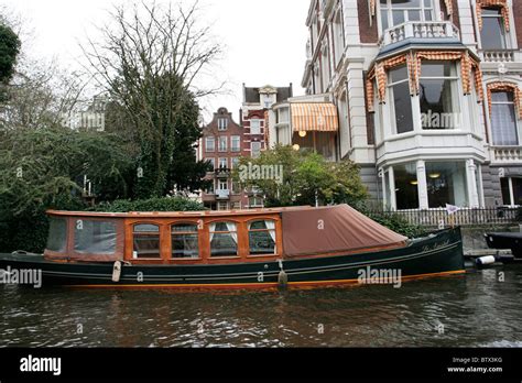 Boat house in Amsterdam, Netherlands Stock Photo - Alamy