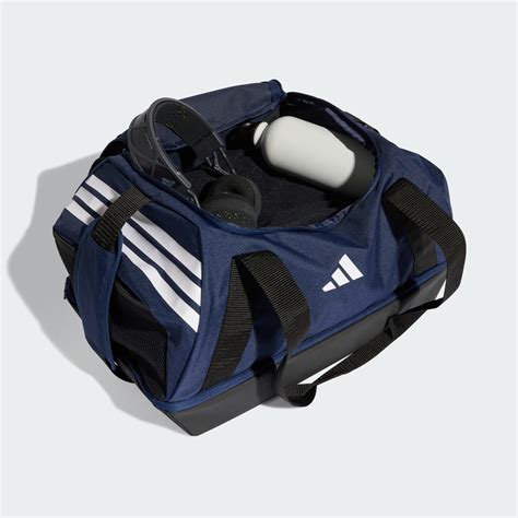 adidas MALETA DEPORTIVA TIRO PEQUEÑA CON COMPARTIMENTO INFERIOR - Azul