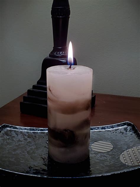 This DIY 30-Second Hack Transforms Boring Candles Into Marble Candles