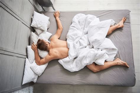 If You Sleep Naked Tonight Heres T In 2025 Sleeping Benefits Benefits Of Sleep Men In Bed