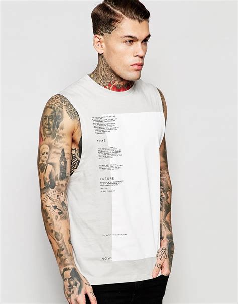 Asos Longline Sleeveless T Shirt With Typographic Print And Stepped Hem