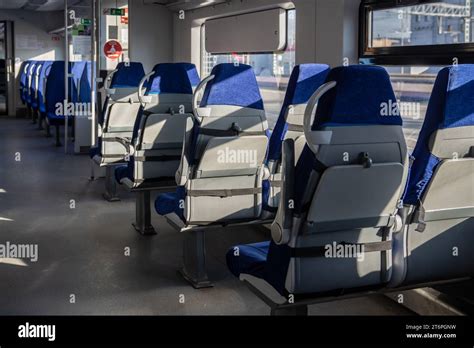 Interior of modern passenger high-speed express train. Inside the train carriage Stock Photo - Alamy