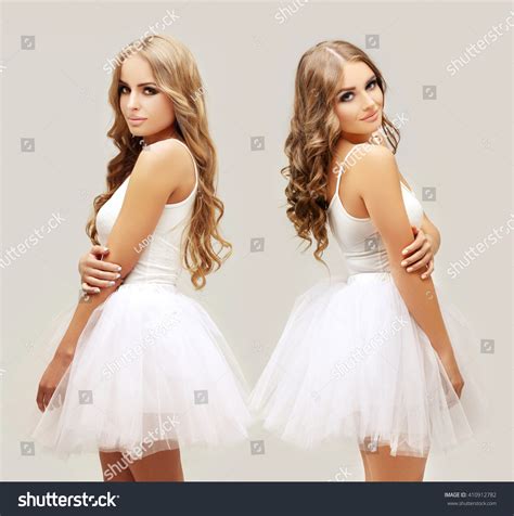 Two Beautiful Blonde Girls Wearing White Stock Photo
