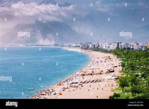 Crowded Antalya City Konyaalti Beach With Hundreds Of Vacationers And