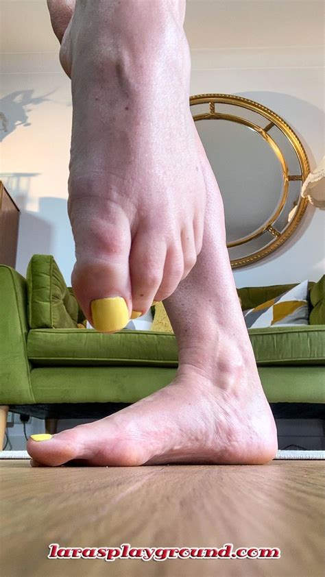 Sexy MILF Lara Strips Naked Takes Off Her Heels To Show Her Lickable Toes NakedPics