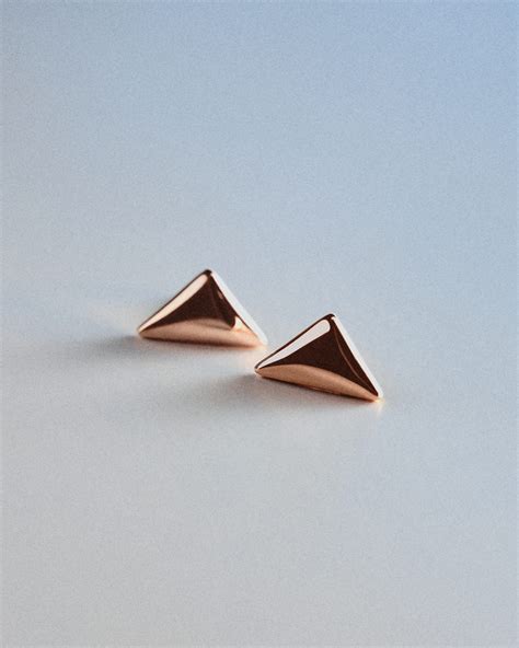 Prada S Pink Gold Jewelry Has Us Dreaming Of Montauk And Linen