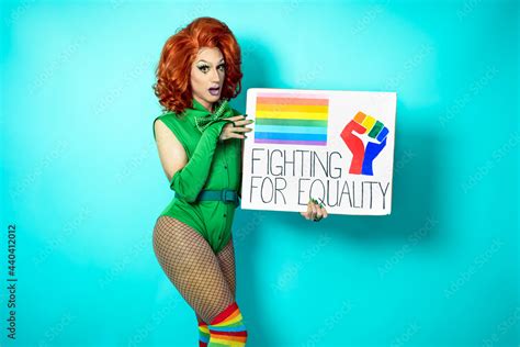 Drag Queen Celebrating Gay Pride Holding Banner With Rainbow Flag LGBTQ Social Movement