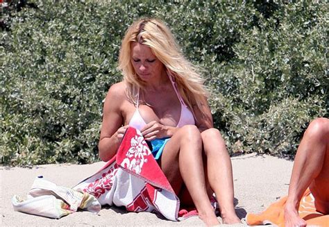 Pamela Anderson Showing Her Big Tits And Shaved Pussy Porn Pictures Xxx Photos Sex Images