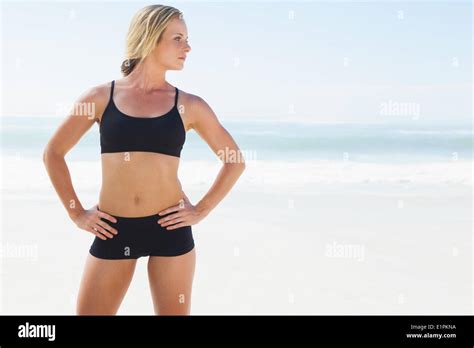 Fit Blonde Standing On The Beach Stock Photo Alamy