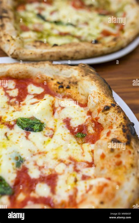 Original Neapolitan Pizza Margherita Served In Naples Restaurant