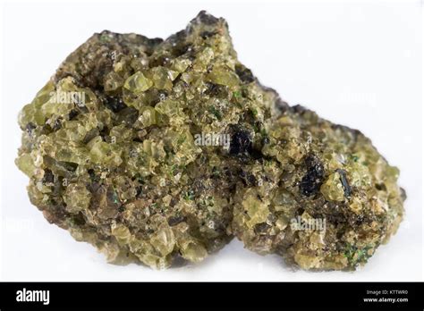 Olivine mineral on white background Stock Photo - Alamy